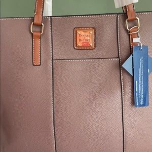 Brand new never been open Dooney and Bourke purse